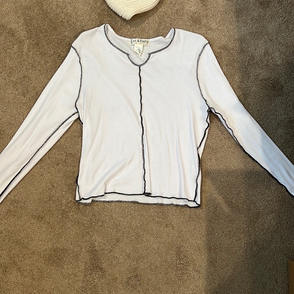 White long sleeve shirt with black on sleeves